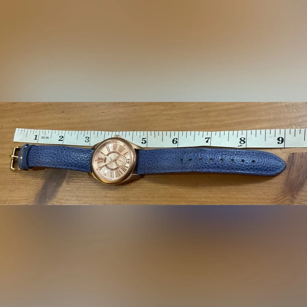Bronzo Italia: woman’s rose/gold/tone Roman numerals numbers boyfriend watch.
